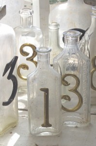 Glass jars with metal numbers