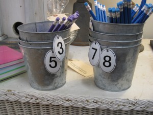 Galvanized pails with number tags from Slate Interiors